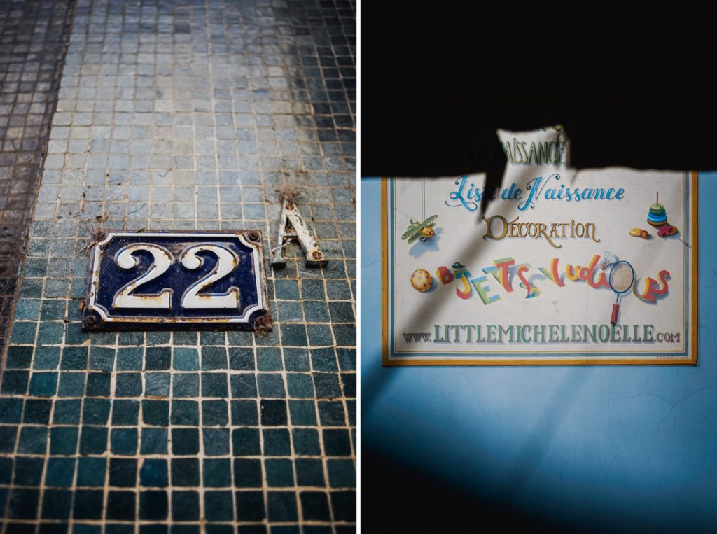 Dos fotos en Córcega: el número 22 sobre azulejos y un escaparate con una lista de nacimiento